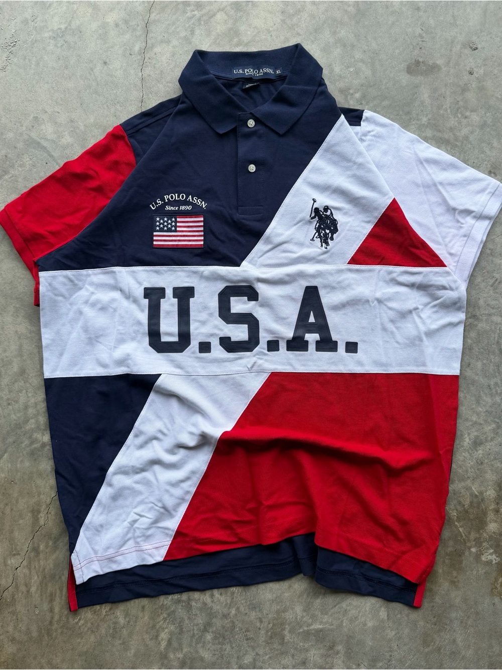 U.S. Polo Assn. USA Flag Red, White, and Blue Polo Shirt.